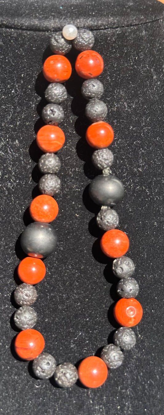 Red jasper with black onyx and lava beads Bracelet